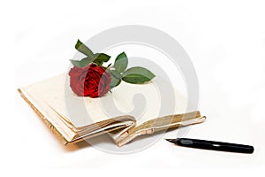 Diary and red rose