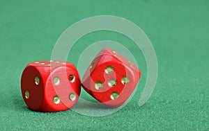Red dice with golden points