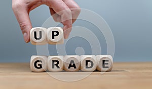 Dice built the word `UPGRADE`