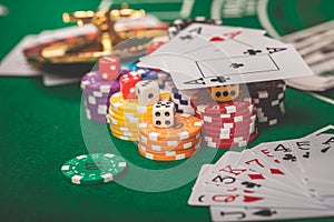 Dice on casino gamble table. Poker chips and banknotes on table in casino