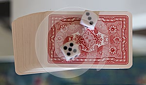Dice, coins and playing cards.