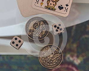 Dice, coins and playing cards.