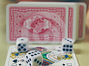 Dice, coins and playing cards.