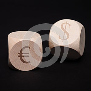 Dice with dollar and euro symbol