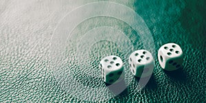 Dice with fives on a green leather table