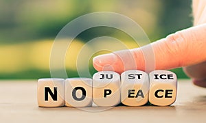 Dice form the expression `no justice no peace`.