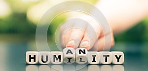 Dice form the words `humility` and `humanity`.