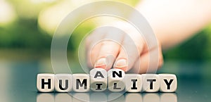 Dice form the words `humility` and `humanity`. photo