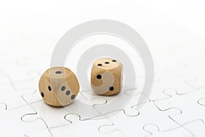 Dice in the jigsaw board. Image use for risk, finding solution for solve problem, background concept