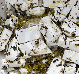 Dice sliced greek feta cheese ith spices