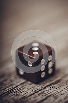 Dice on table, vintage effect. Background for casino games, gambling, luck or randomness. Rolling the dice concept for business