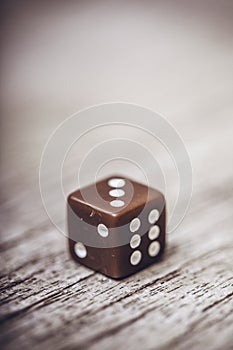 Dice on table, vintage effect. Background for casino games, gambling, luck or randomness. Rolling the dice concept for business