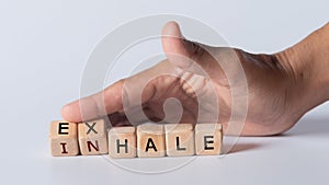 Dice with text for illustration of `exhale and inhale` words