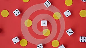Dice and Yellow Chips on a Red Background
