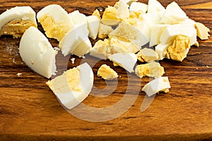 Diced Cooked Egg on Wooden Cutting Board Close Up
