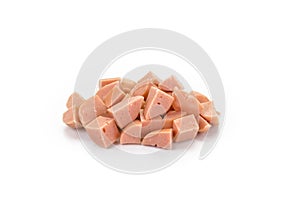 Diced cooked pork sausages isolated on white background