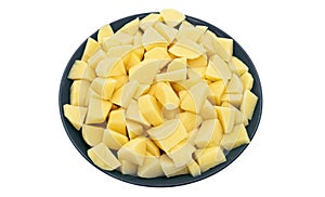 Diced potatoes in a plate isolated on a white background