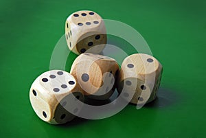 Dices on green background