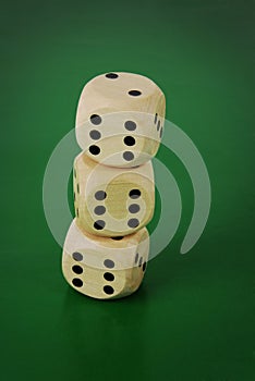Dices on green background