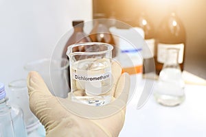 Dichloromethane in glass, chemical in the laboratory