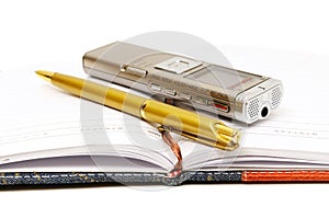 Dictaphone, notepad and ballpen