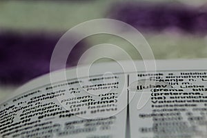 Dictionary text in drop of water