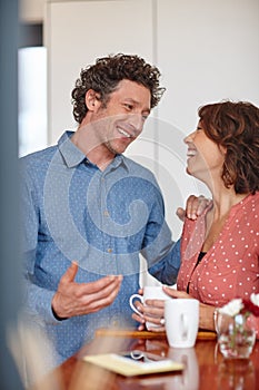 Did I tell you how amazing you are to me. a happy husband and wife having a conversation at home.