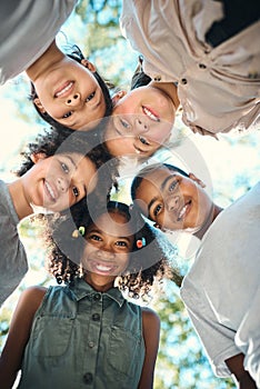 Did someone say summer camp. Shot of a group of teenagers standing in a circle in nature at summer camp.