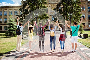 We did it! Yes! Successful future for smart youth! Six attractive young bachelors are near university, standing near the building