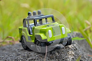 Diecast metal jeep 4x4 offroad on the stone