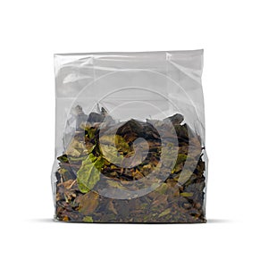 Died Organic green tea blend leaves packed in a plastic package isolated on white background