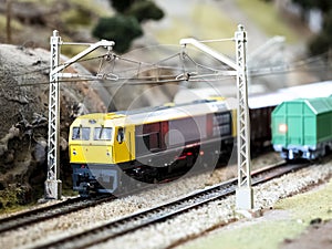 diesel electric locomotive model train with blurred background