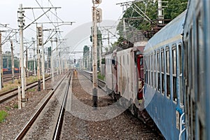 Diesel and electric locomotives on a person train