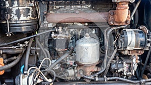 The diesel engine of an old tractor, background.