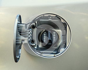 Diesel fuel cap of a grey car