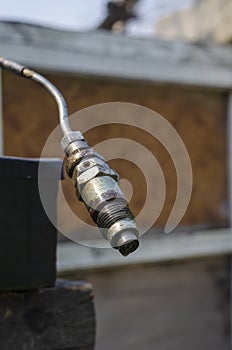 Diesel fuel injector with a drop of fuel