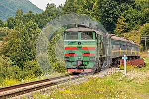 Diesel locomotive on bridge over canyon