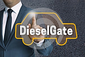 DieselGate auto touchscreen is operated by businessman concept