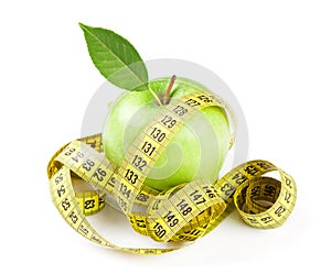 Diet concept. Apple and tape measure