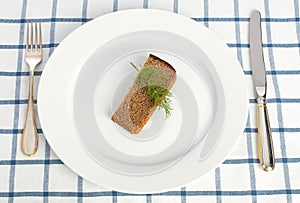 Diet concept (bread and dill on the plate)