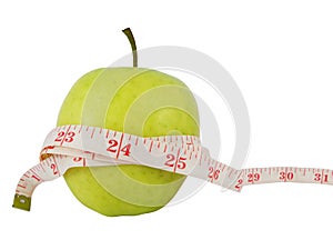 Diet concept with a green apple and a measure tape