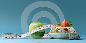 Diet concept. Healthy food and measuring tape. Blue background, space for text. AI generated