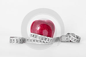 Diet concept - red apple with tape