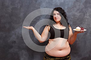 Diet, dieting concept. Beautiful young obese overweight woman wi