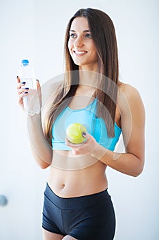 Diet and Drinking Water. Woman with bottle of water