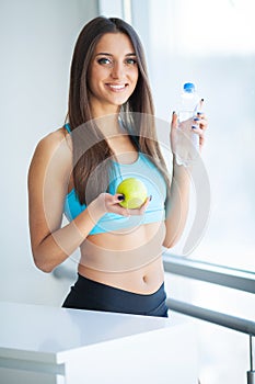 Diet and Drinking Water. Woman with bottle of water