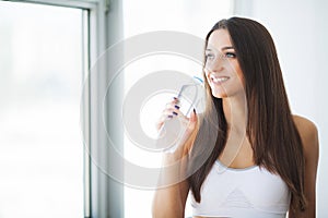 Diet and Drinking Water. Woman with bottle of water