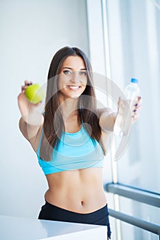 Diet and Drinking Water. Woman with bottle of water