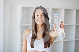 Diet and Drinking Water. Woman with bottle of water