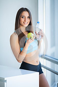 Diet and Drinking Water. Woman with bottle of water